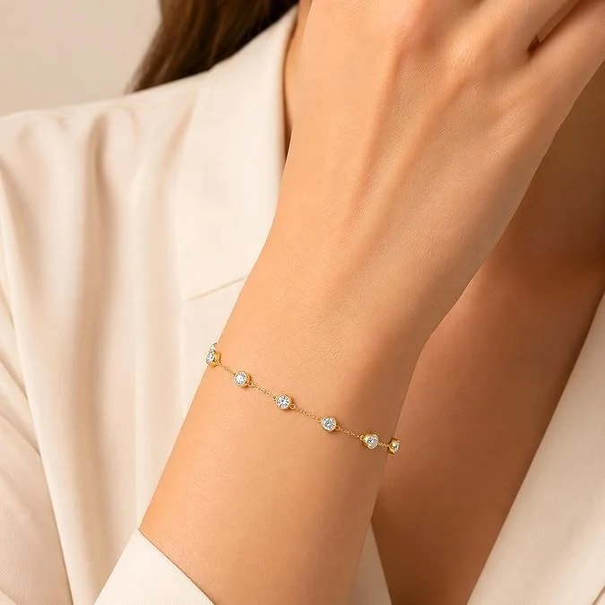 Lab-grown diamond station bracelet worn on a wrist