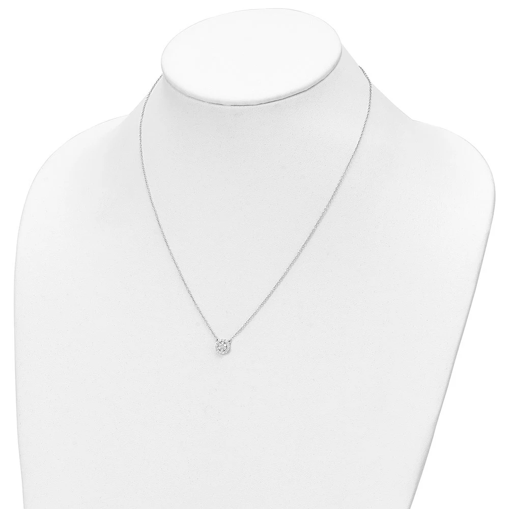 Diamond halo pendant necklace worn on a mannequin bust